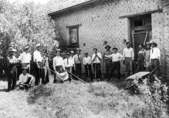Image of men working with Hay, NMSU cooperative Extension Service